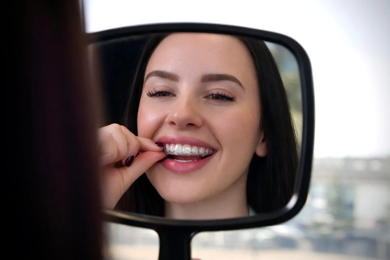 Putting in clear aligners